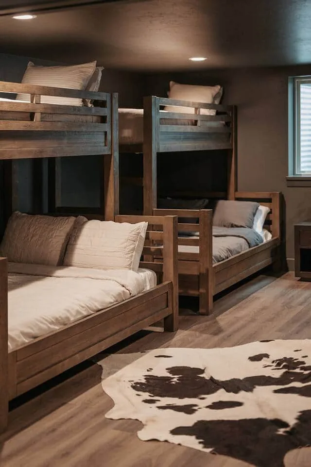 Custom wood bunk beds in the group bunk room